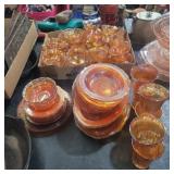 Carnival glass dishes, glasses, and cups