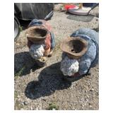 2 resin woman and male bent over farmer figurines