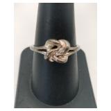Silver knot ring marked 925 size 8 .105oz