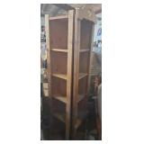 2 wooden corner shelving units