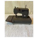 Senate kids sewing machine. Top layer is pealing