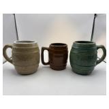 Green McCoy barrel Stein, cream Uhl barrel stein,