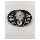 Silver black/inlay brooch marked alpaca Mexico.