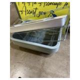 Three bus tubs, two baking pans, and two sterno
