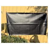 Piece of black vinyl 54 x 30. piece of green oil