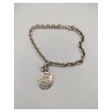 Silver charm bracelet marked 925 .375oz