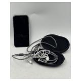 iPhone with cables and earbuds
