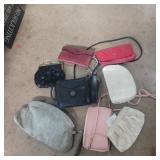 Assorted bags, clutches, and purse
