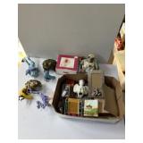 collection of decorative frog and bird figurines,