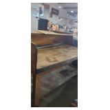 Large wooden shop work table need some work