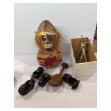 Hand-carved coconut pirate statue playing