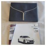 Maserati warranty card and leather holder
