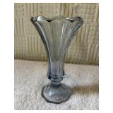 Fostoria light blue flower vase 7 inches tall.