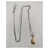 14k white gold necklace with charm marked 14k