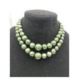 Double strand green beaded necklace