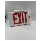 plastic LED exit sign with a plug-in power cord