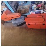 3 empty chain saw cases