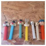 Looney tunes and peanuts pez dispensers
