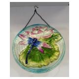 round, embossed glass decoration depicting a