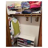 Closet, full of womenï¿½s clothes, excluding shoes