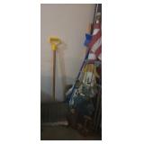 Lawn decor , flag with pile. Snow shovel and
