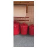 3 red GHA matching canisters