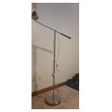 Articulating floor lamp