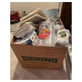 Large box of disposable party supplies, including