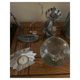 Metal figurines, glass orb paper weight, and