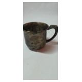 Silver cup marked Sterling 7 grams