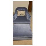 Blue upholstered rolling lounge chair with