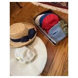 Collection of hats and pair of knitted mittens