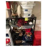 Entire contents of shelf, including shelf. Candle