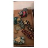 Stone grapes , pottery fish and more