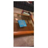 Square glass top wooden frame coffee table