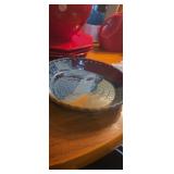 Decorative glazed pottery pie dish signed Rhoads