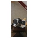 Konica C35 camera with accessories