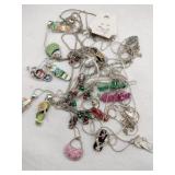 Group of silvertone flip flop pendant necklaces