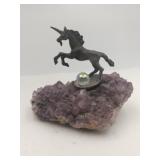 Pewter unicorn figurine mounted  on a natural
