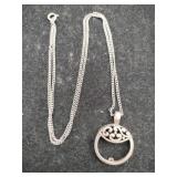 Silver round pendant necklace with charm large
