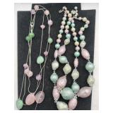 2  purple and green beaded necklaces