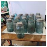 21 blue glass quart ball jars