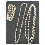 White and gold beaded necklaces with matching