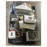 Lidded tote of office supplies