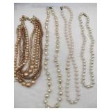 White beaded necklaces (1 strand broke)