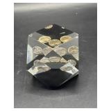 geometric paperweight with suspended gold-toned