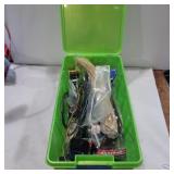 Pipe cleaner and wire in a container with lid