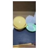Old Tupperware yellow lid has small crack