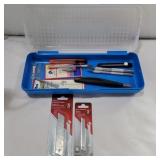 Exacto knives and other knives on container with