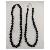 2 black beaded necklaces